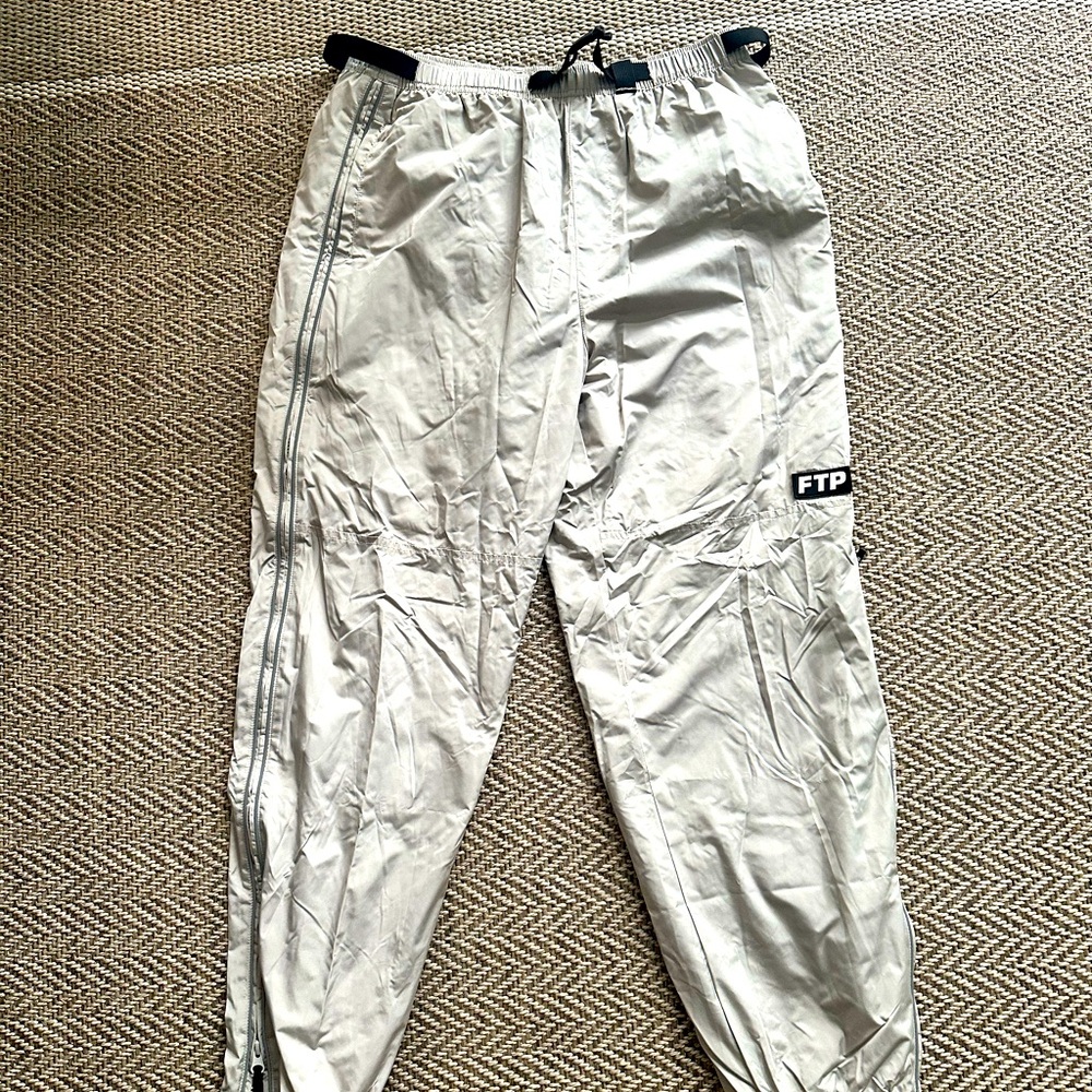 FTP windbreaker pants. L. Although photo is wrinkled they are barely worn.